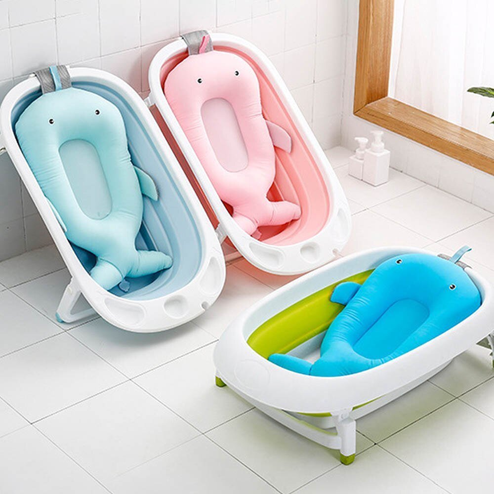 "Baby-shaped bath mat with suction cups, offering secure stability and grip for a worry-free bathing experience."
